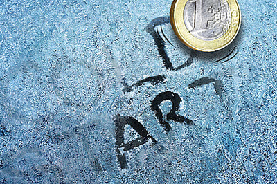 Mit einer 1-Euro-Münze aufschraffierte Fläche