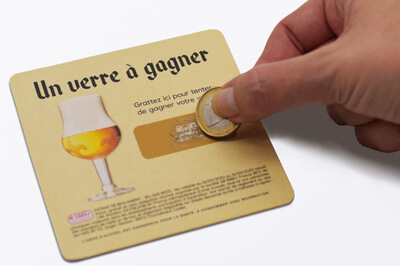 Bierdeckel mit goldenem Rubbelfeld, welches frei gerubbelt wird