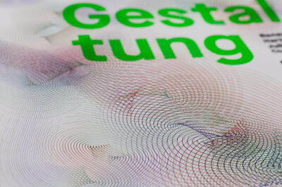 Flyer mit Ornamenten und als Text in grün Gestaltung